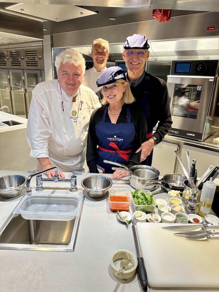 Julie, founder of Ethos Luxury Travel hanging out with the chefs onboard the Explora I through the Carribean