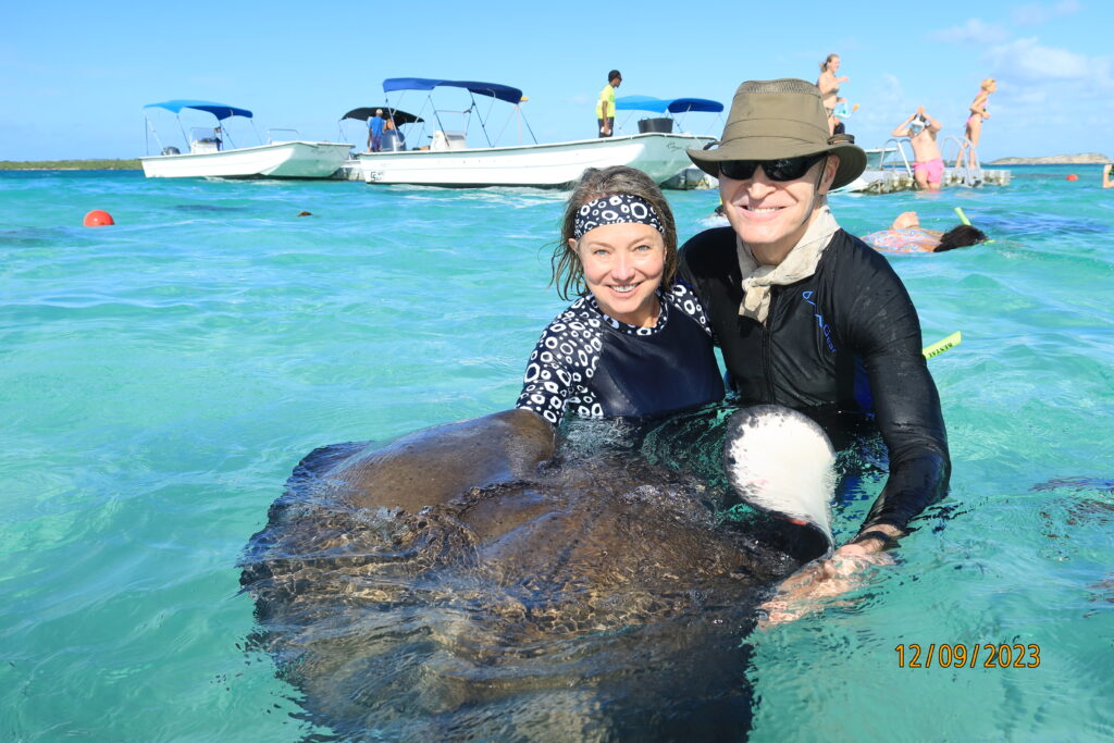 Julie, founder of Ethos Luxury Travel swimming with stingrays as part of the Explora I cruise ship's excursions