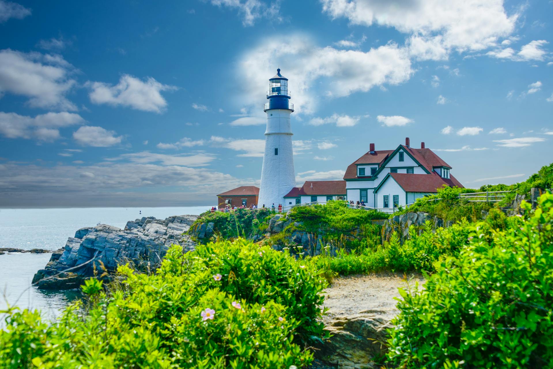 A Portland Maine Head Light Near the Green Trees and Ocean