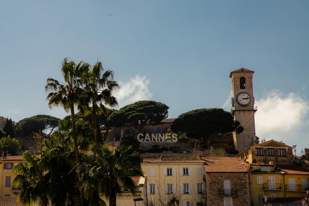 a sign in cannes reading cannes on a small hillside