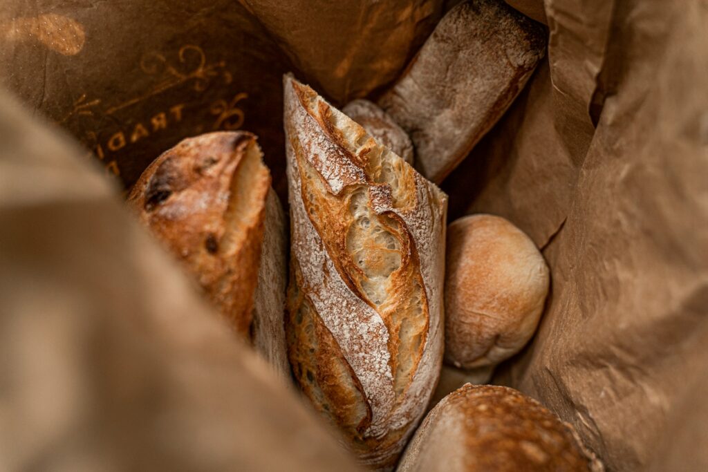 french bread in a brown paper bag