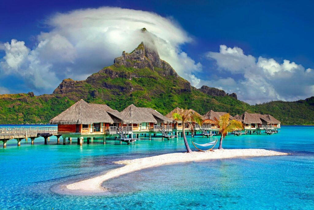 Cottages In The Middle Of Beach in French Polynesia