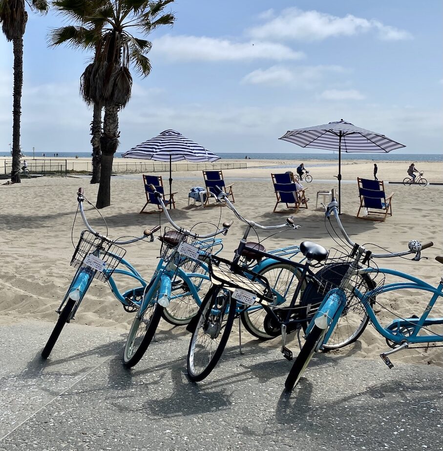 bikes sitting in the sand at Shutters Hotel