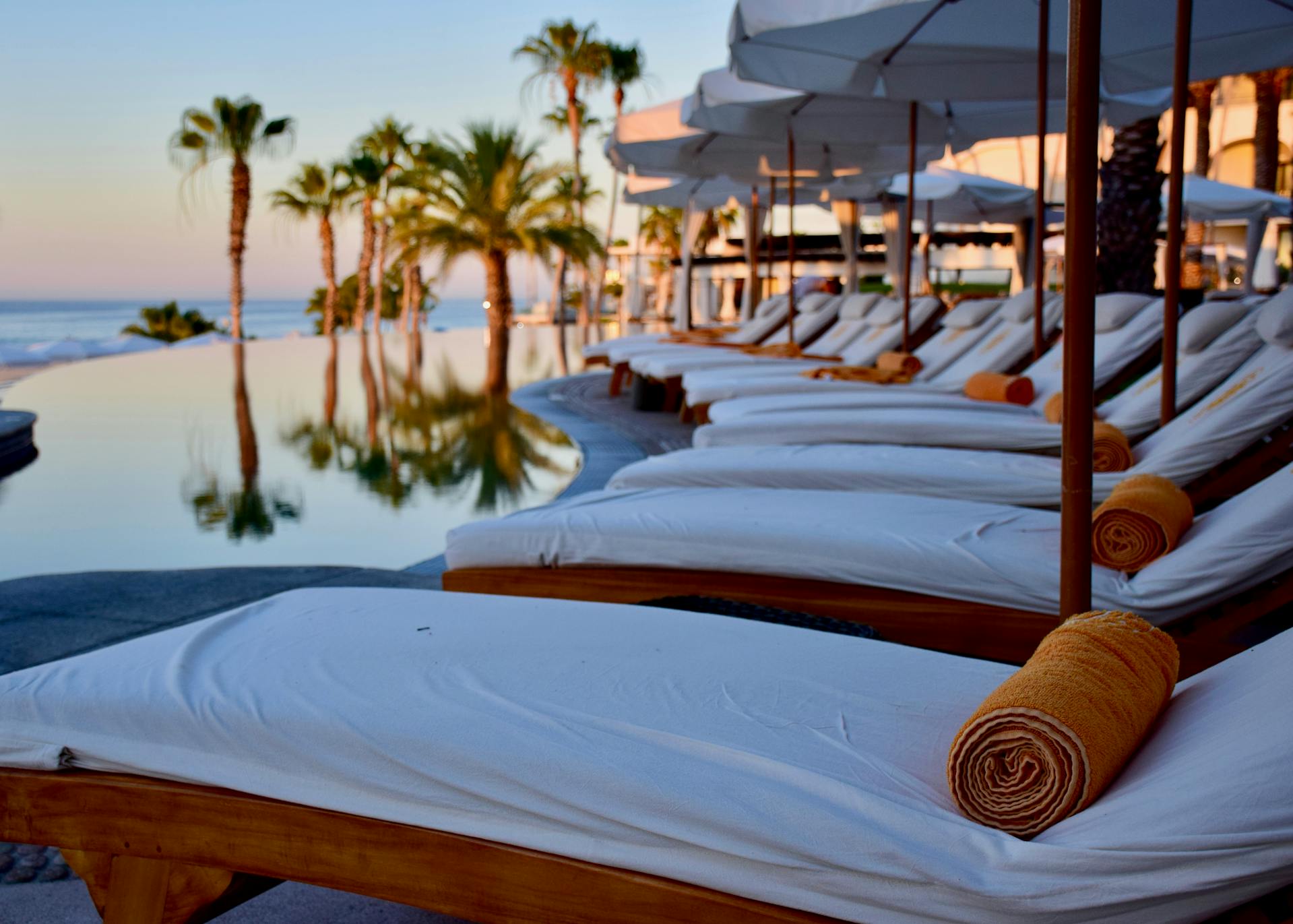 White Outdoor Lounge Chairs at a luxury wellness spa retreat