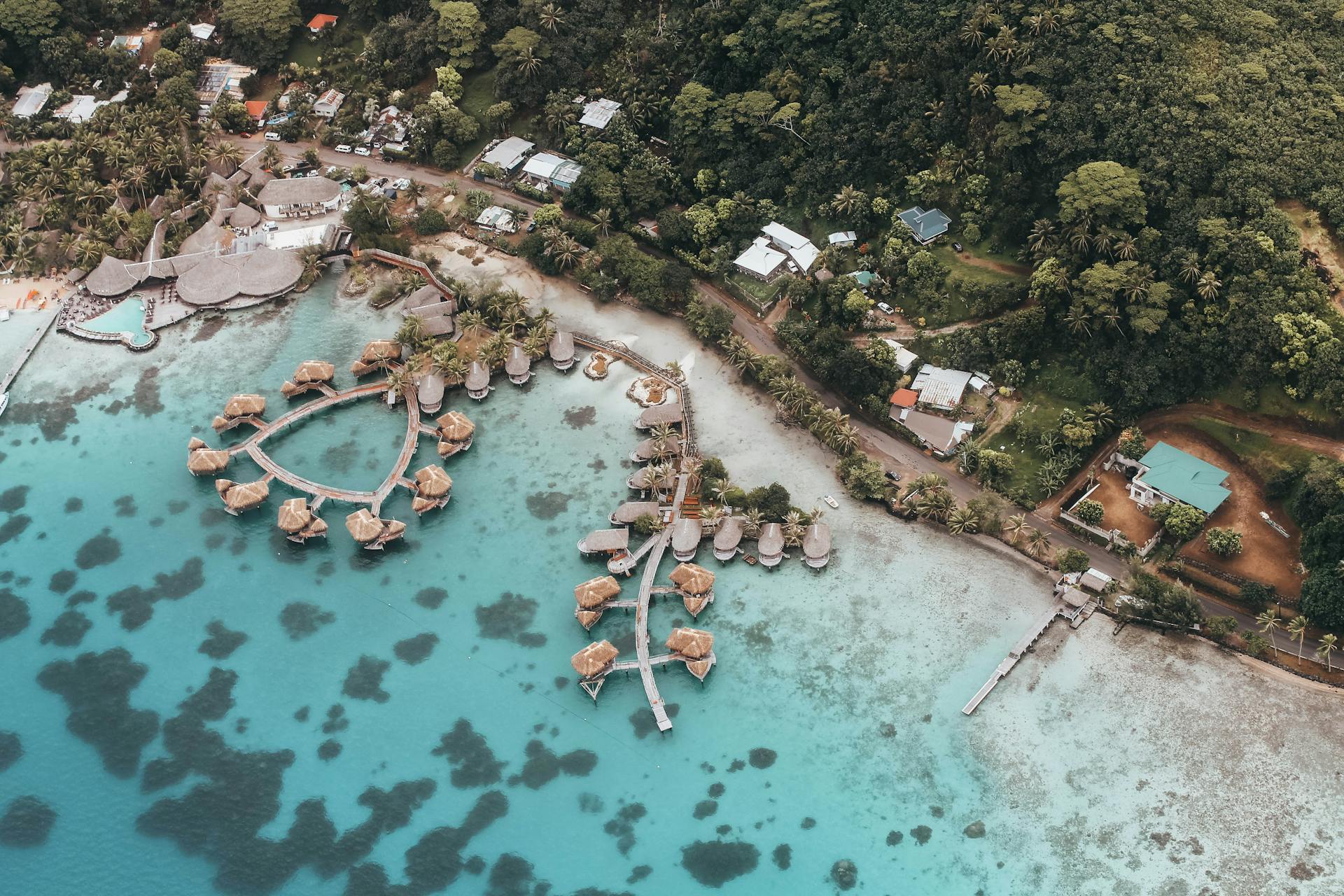 aerial view of seaside huts in french polynesia