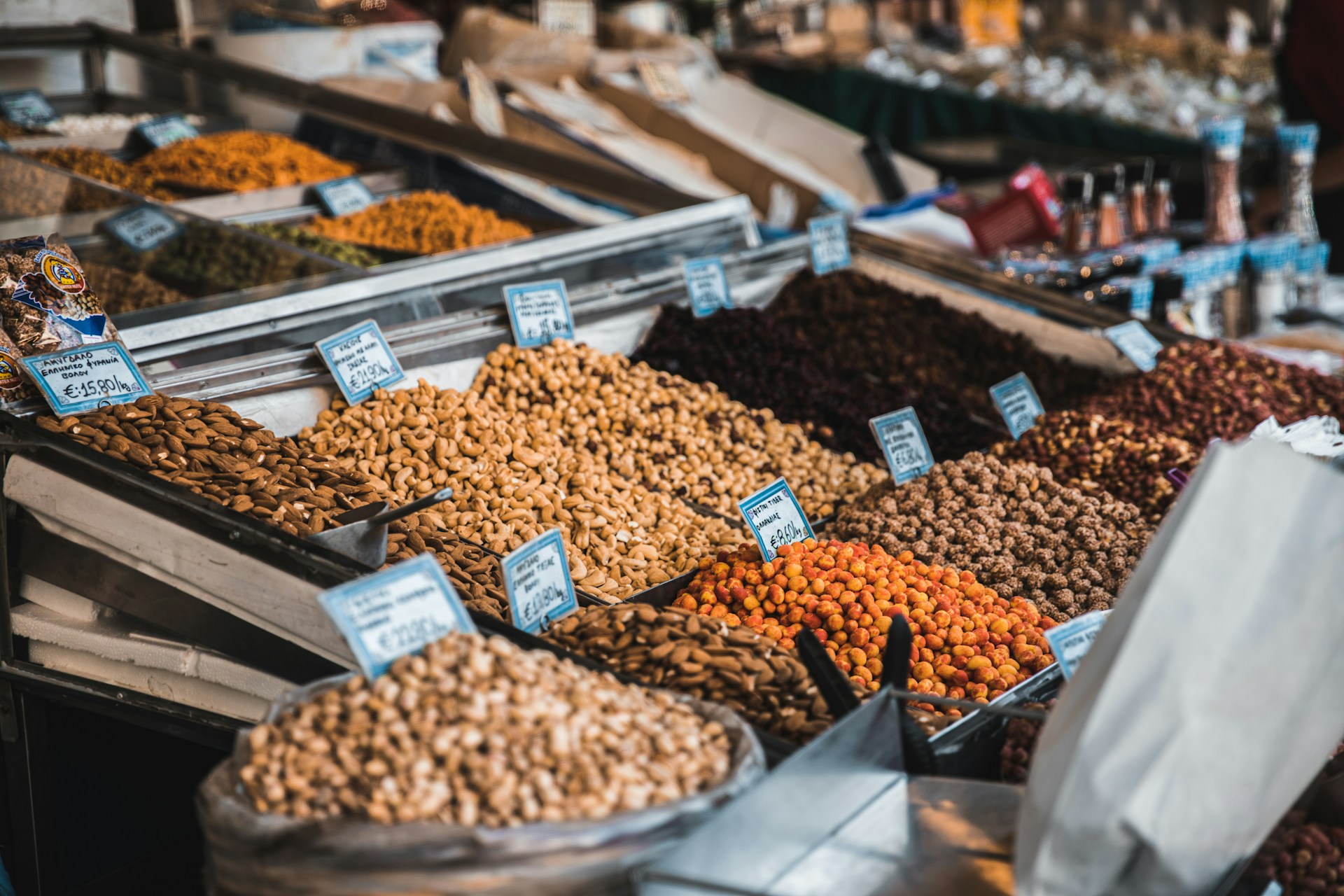 assorted beans displayed at a market in athens