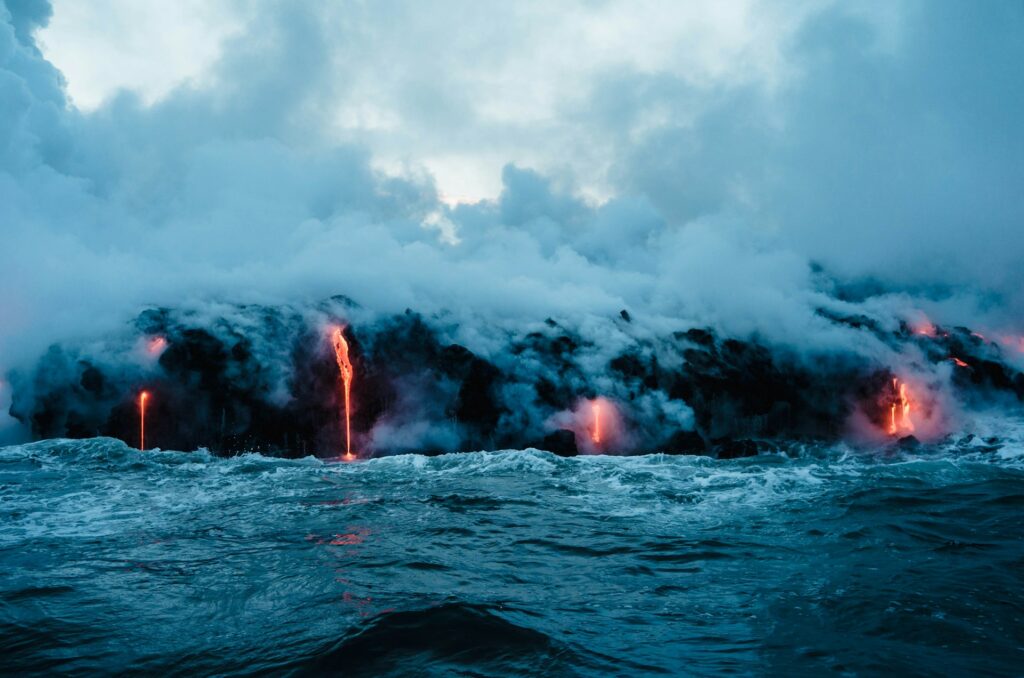 lava dripping into ocean during lava tour