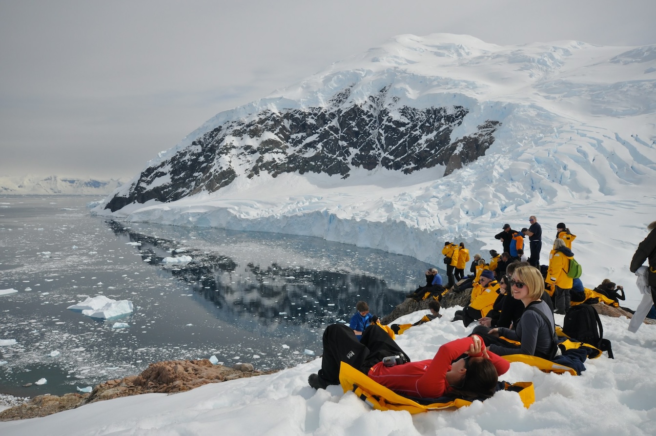 people on a snowy hill as part of an expedition