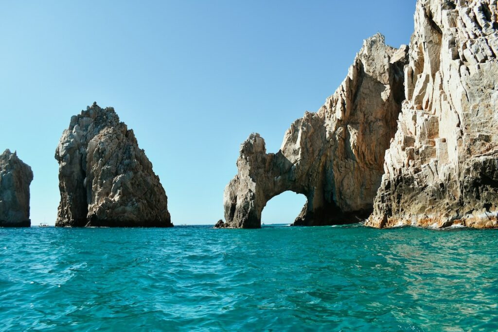 rock formation jutting off land in cabo san lucas